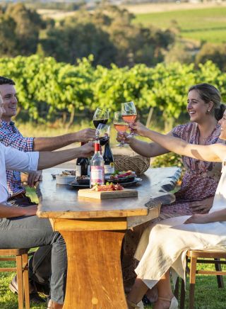 Friends enjoying wine tasting at Grove Estate Wines, Young