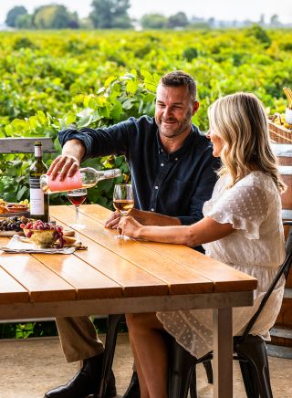 Couple enjoying a visit to Yarran Wines, Yenda just north of Griffith