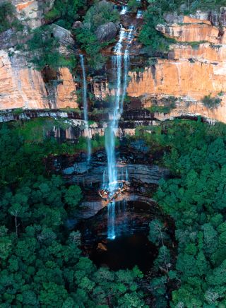 Aerial overlooking a waterfall, Blue Mountains National Park