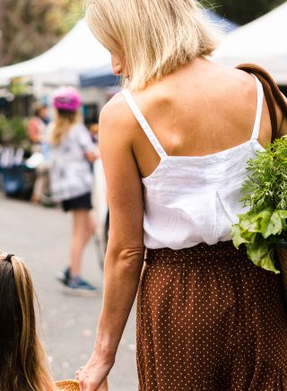 Family enjoying a visit to Yamba Farmers and Producers Market, Yamba