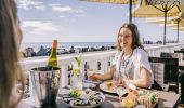 Friends enjoying food and drink at Latitude 30, Coffs Harbour, North Coast