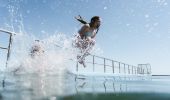 Child enjoying a sunny day at Forster Ocean Baths, Forster