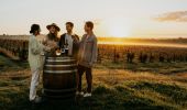 Friends enjoying wine in the vineyard at Hope Estate, Hunter Valley