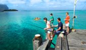Family enjoying a day of fishing Lord Howe Island Wharf, Lord Howe Island